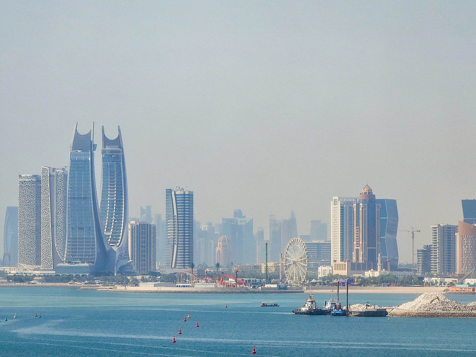 The Katara Towers and the Lusail City skyline across the water from Qetaifan Island, Qatar