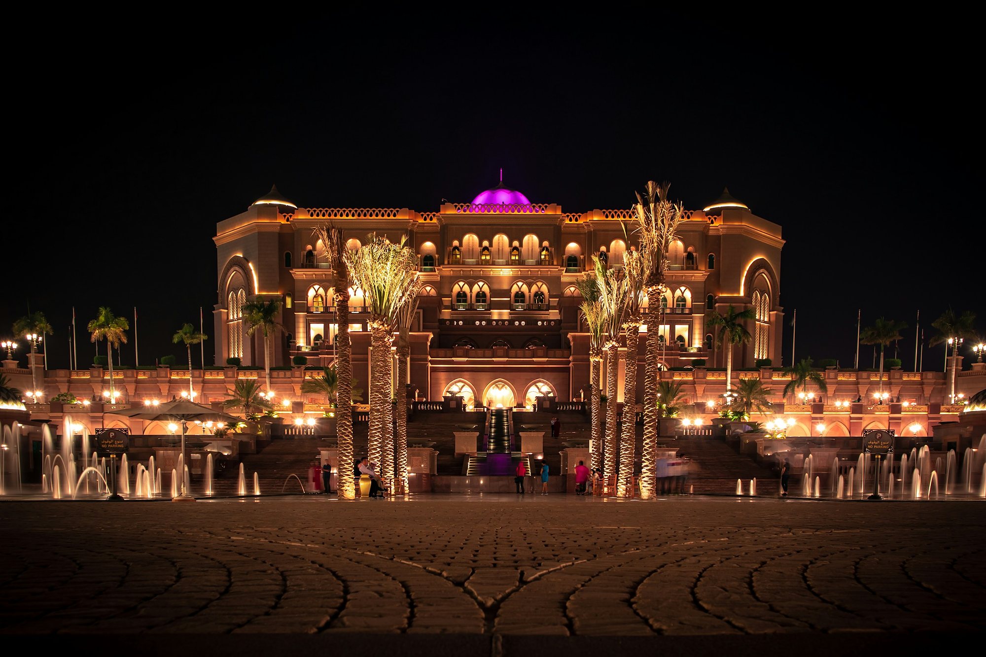 Emirates Palace lit gold at night, Abu Dhabi