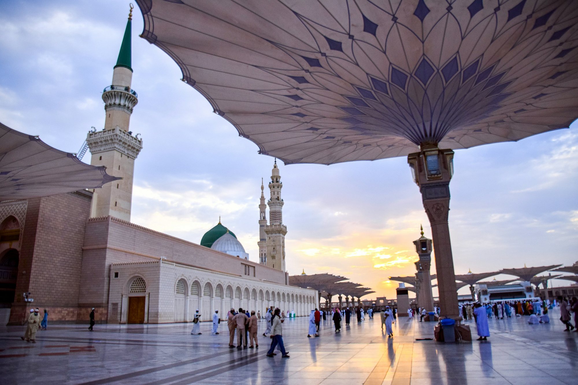 The Green Dome and minarets of the Prophet’s Mosque under its great umbrellas at sunset