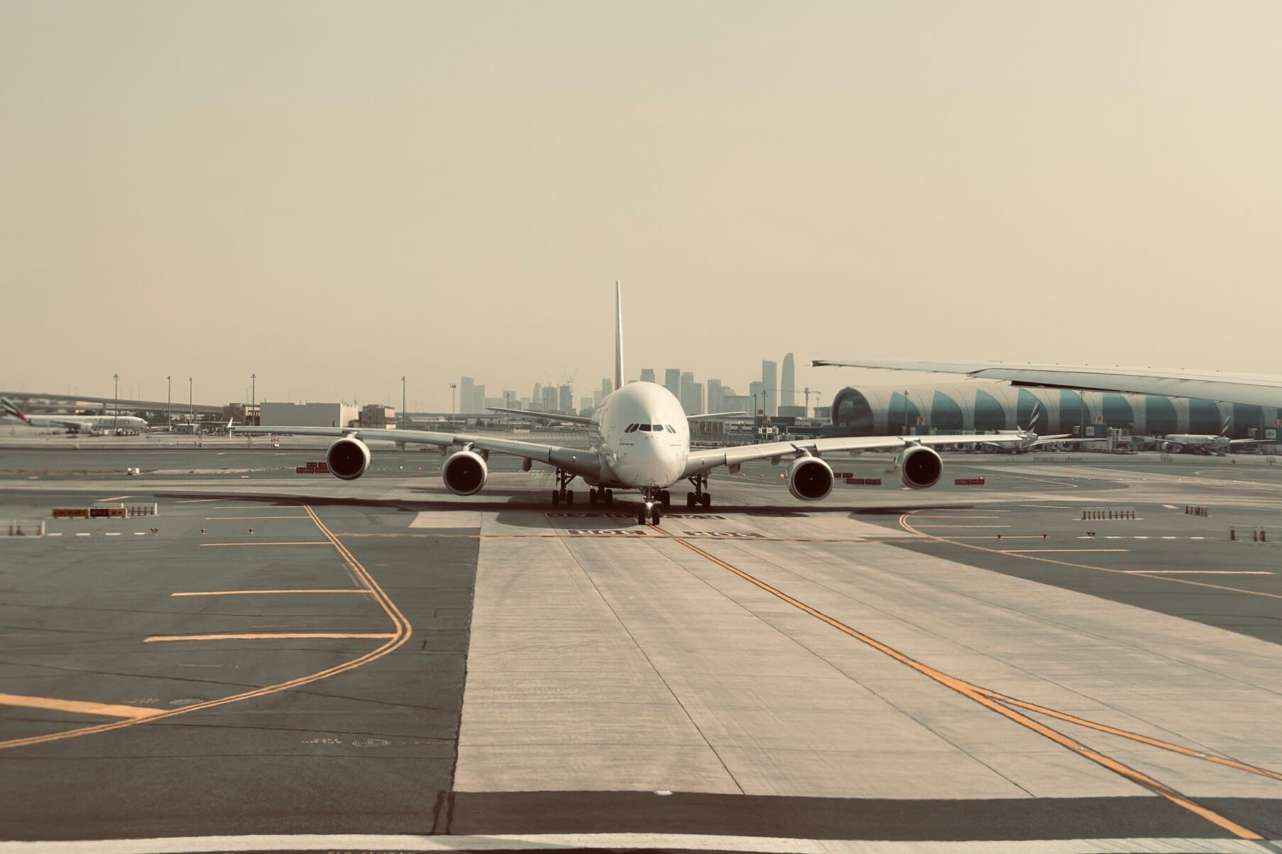An Emirates A380 taxiing at Dubai International Airport