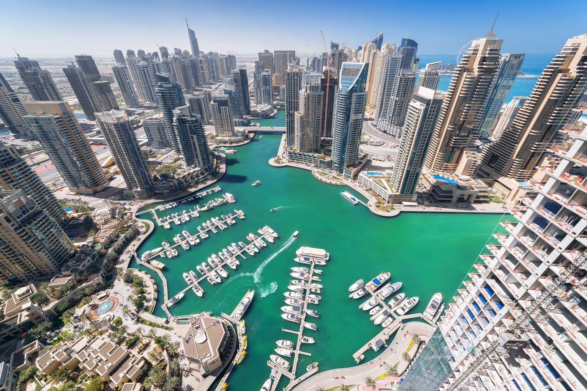 Yachts on their pontoons in Dubai Marina, seen from high above the towers