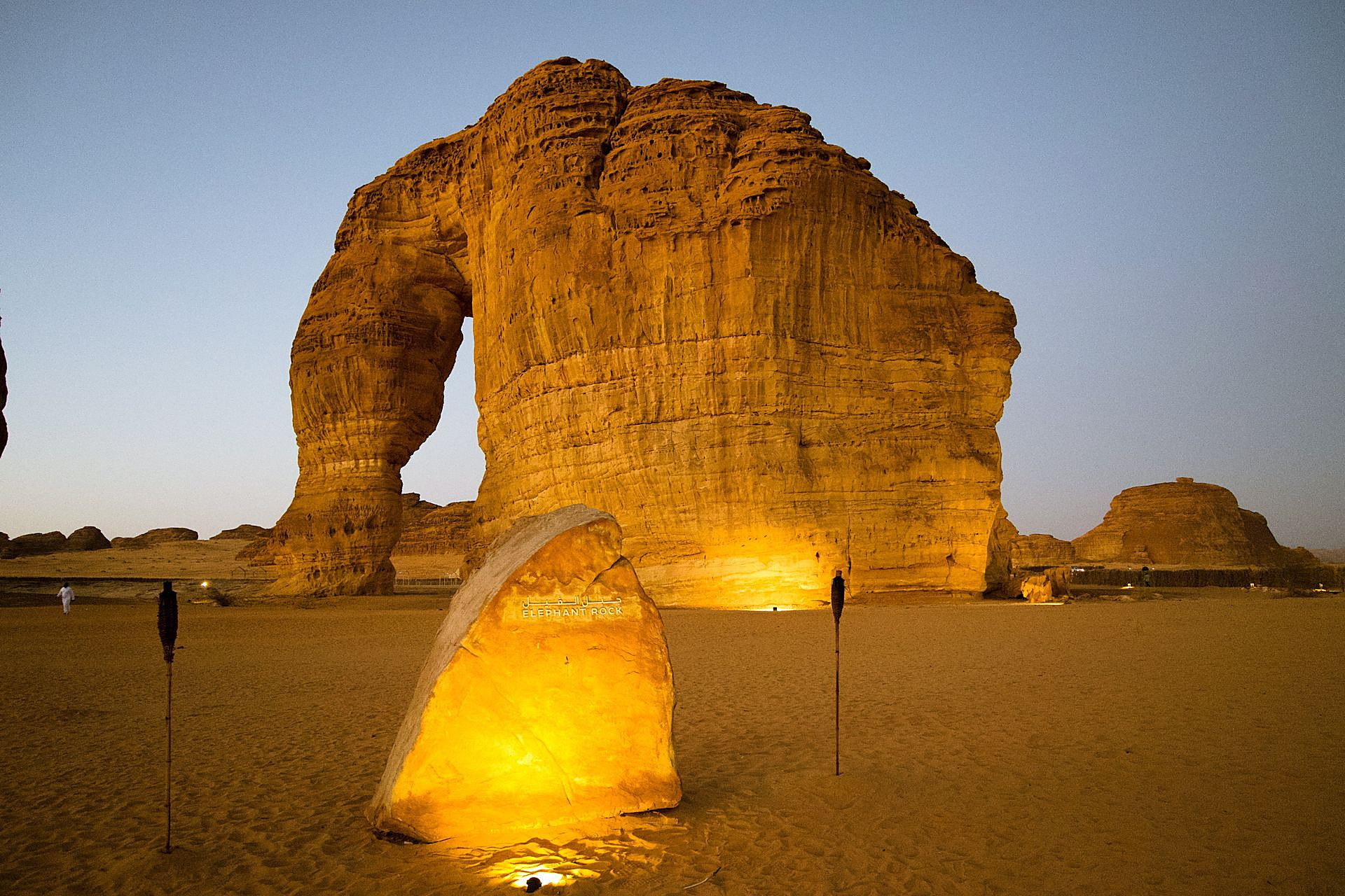 Elephant Rock in AlUla glowing gold at dusk