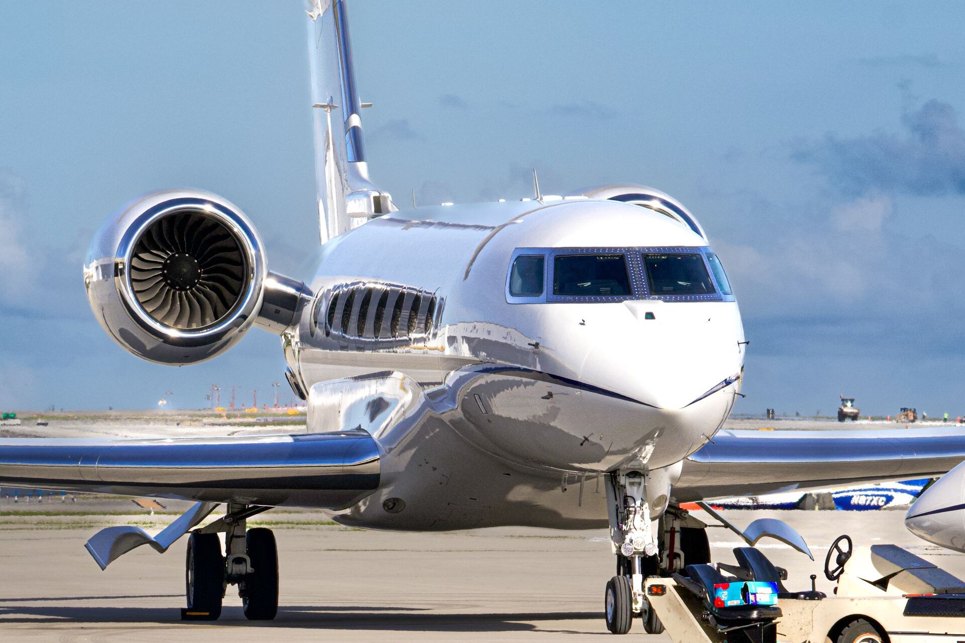 A Gulfstream private jet on the apron, ready for its passengers