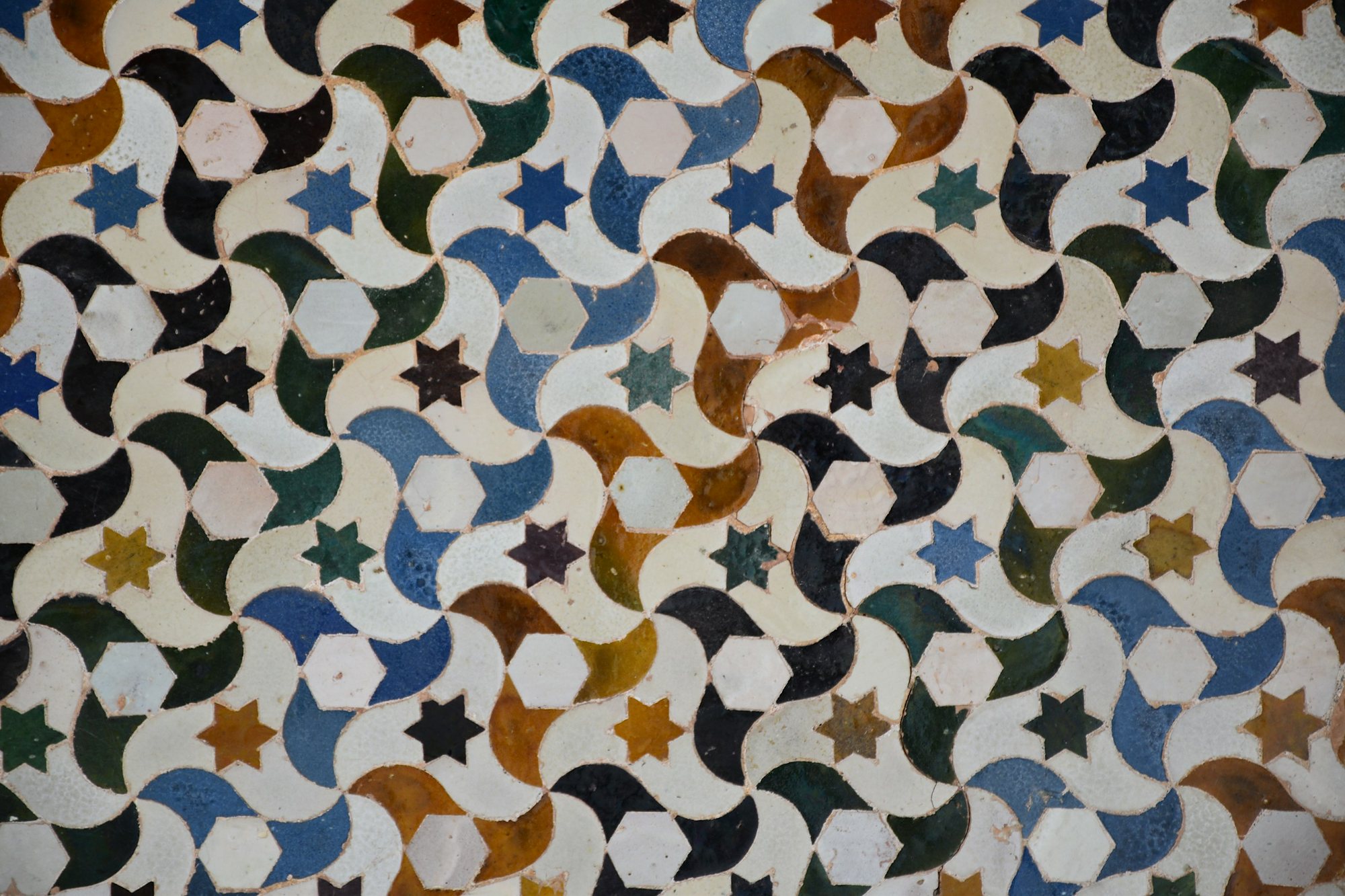 Moorish zellij tiles of stars and interlocking shapes
