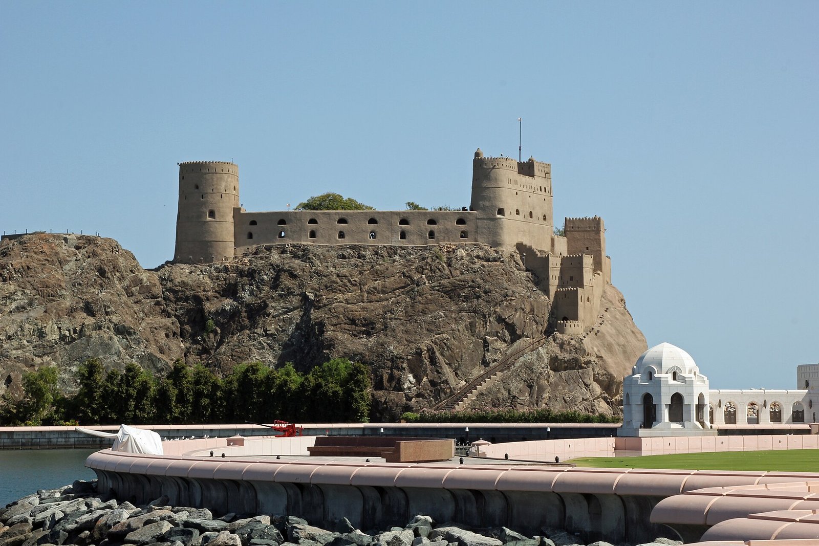 Al Jalali Fort crowning its rocky outcrop above the harbor of Old Muscat.