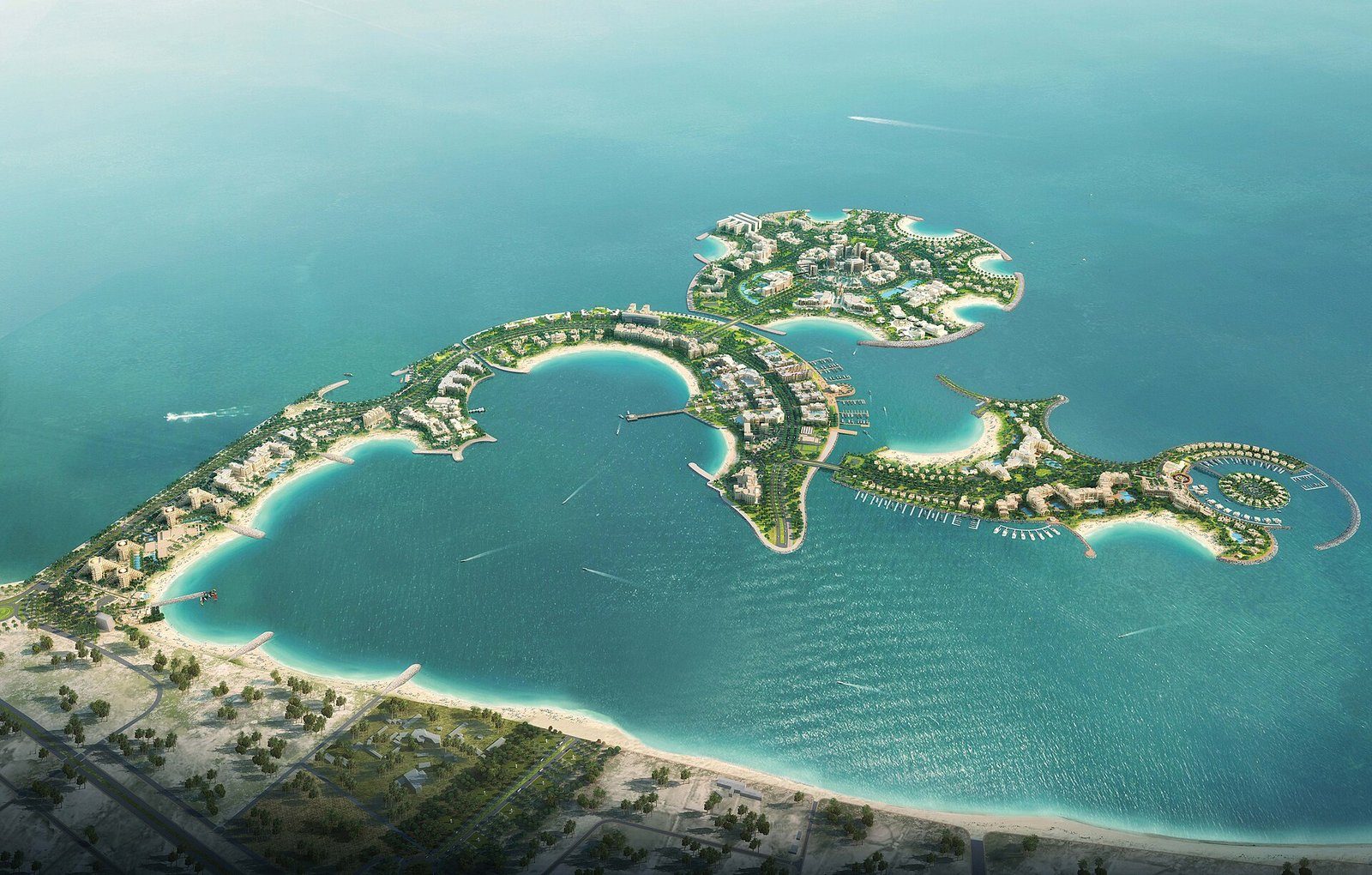 La isla de Al Marjan vista desde el aire, con sus cuatro islas en forma de coral que se curvan sobre las aguas turquesa del Golfo frente a Ras Al Khaimah.